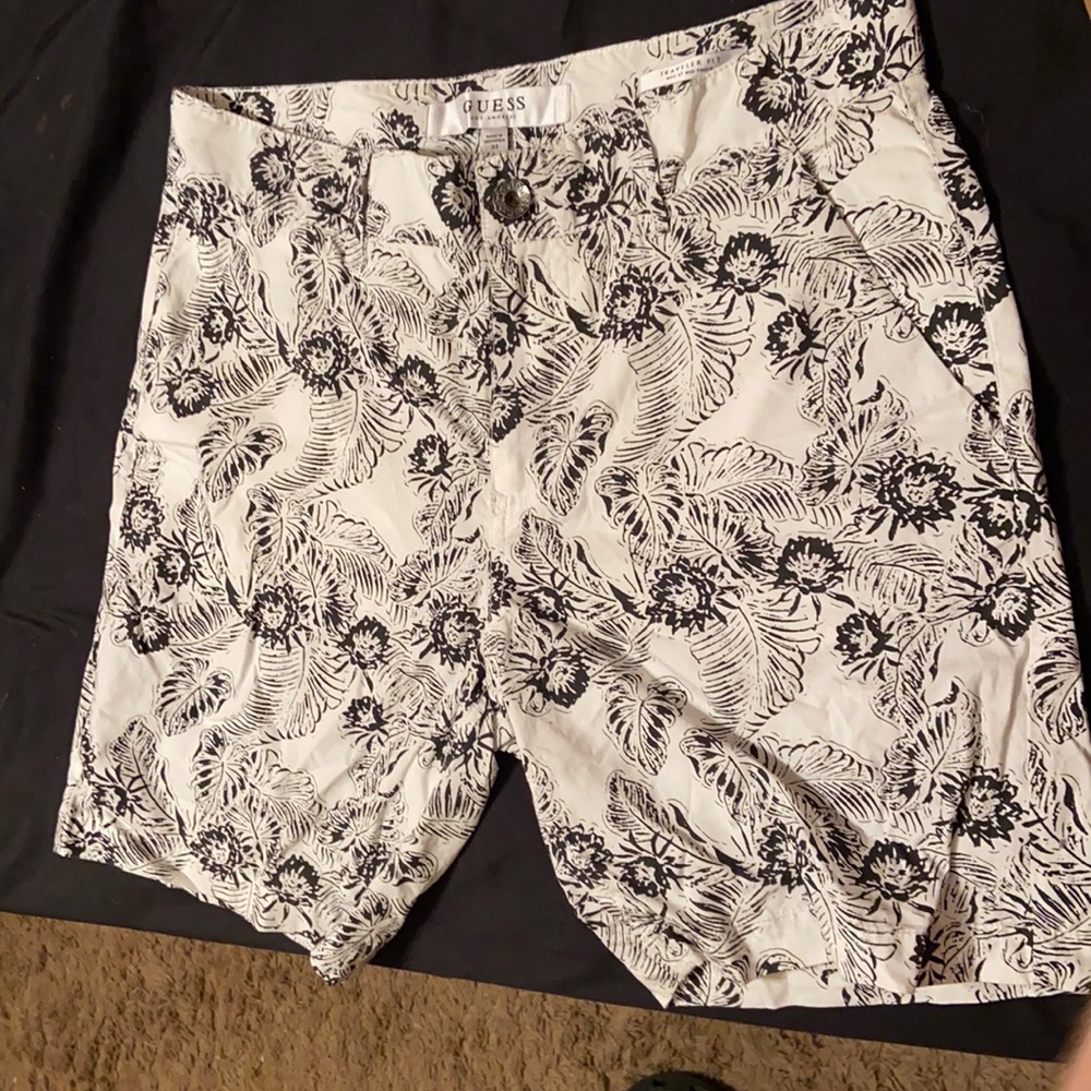 2 pairs size 33 shorts. izod and guess